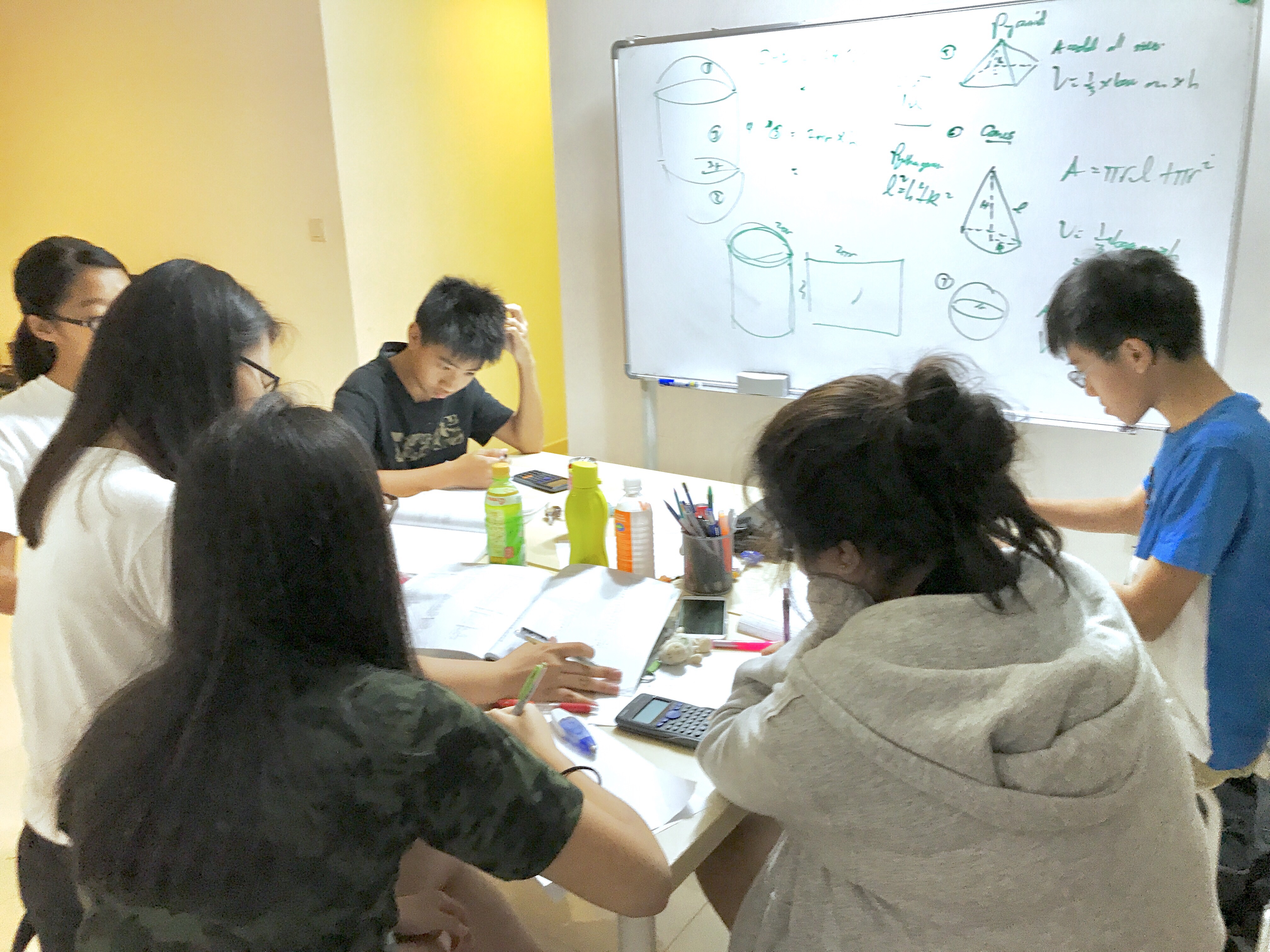 Secondary 2 Mathematics tuition focused on mensuration and memorising formulas.