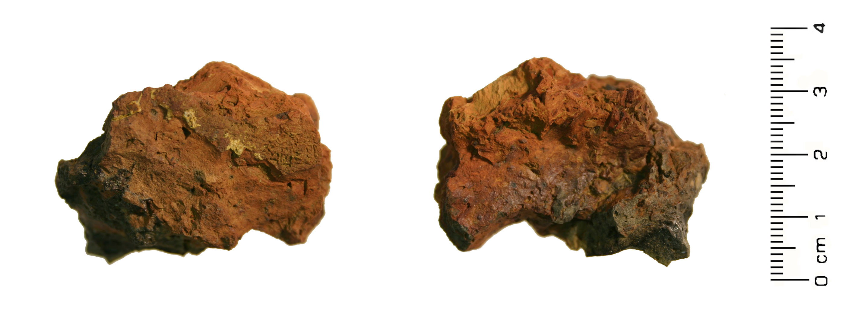 Authentic iron bloomery slag fragment with vitrified clay and iron-rich material recorded by the Portable Antiquities Scheme, FindID 284407, photographed by Teresa Gilmore.