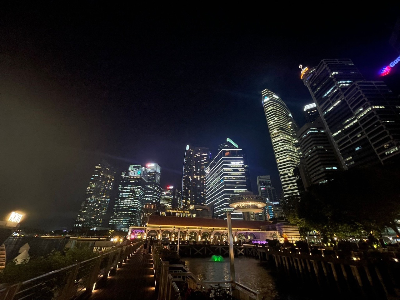 The Fullerton Bay Hotel with Singapore's financial district skyline in the background.