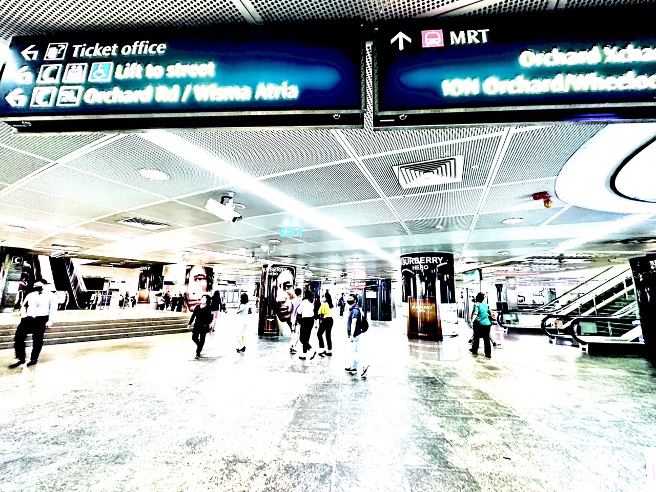 Entrance foyer at Orchard MRT station in Singapore.