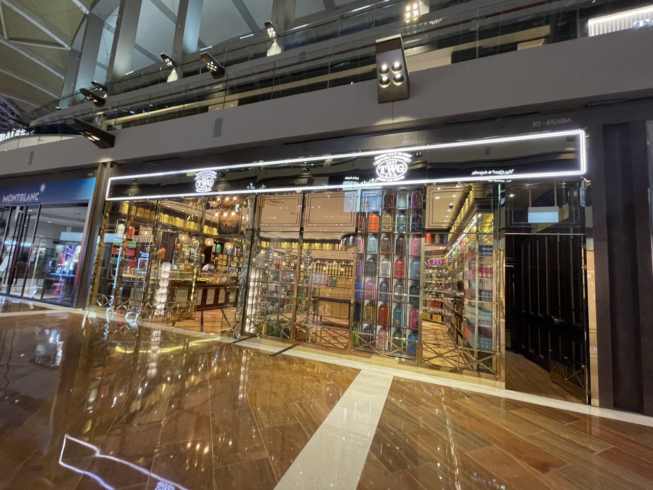 TWG Tea storefront with packaged tea products on display.