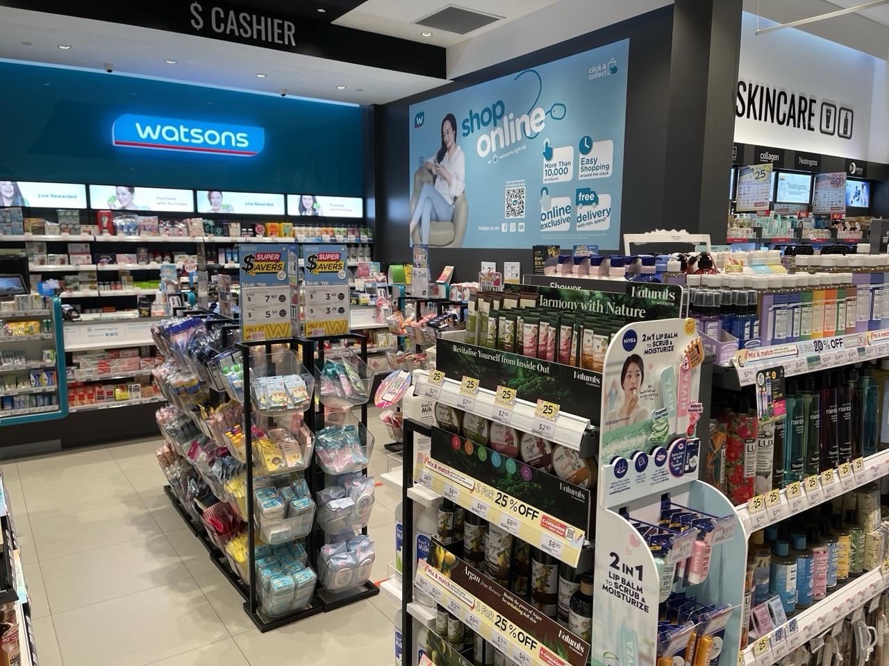 Pharmacy and skincare products displayed on retail shelves.