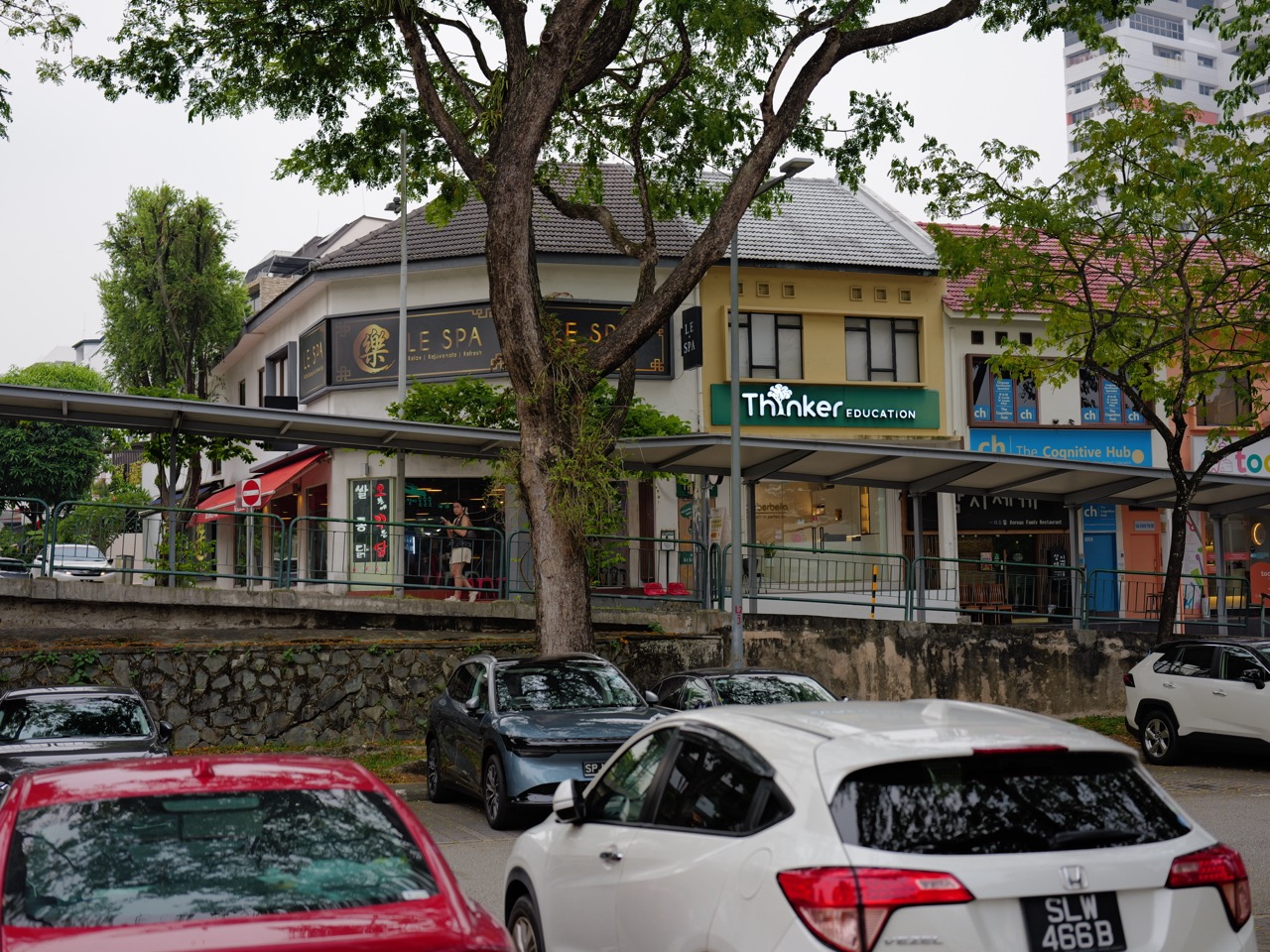 Exterior detail of heritage shophouses along Chun Tin Road in Bukit Timah, Singapore.