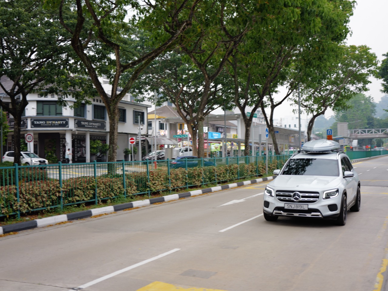 Car along Upper Bukit Timah Road with a view toward Cheong Chin Nam Road.