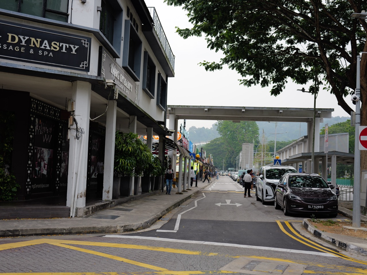 Beauty World MRT station exterior with Chun Tin Road and Cheong Chin Nam Road shophouses and restaurants nearby.