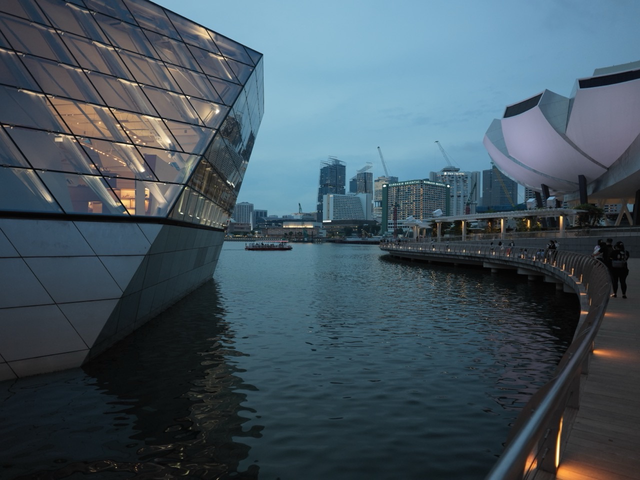 Louis Vuitton Island Maison on the left and ArtScience Museum on the right at Marina Bay Sands in Singapore