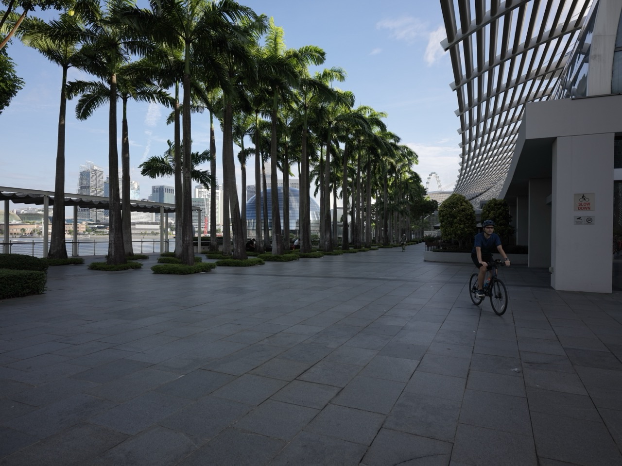 Cyclist outside Marina Bay Sands in Singapore
