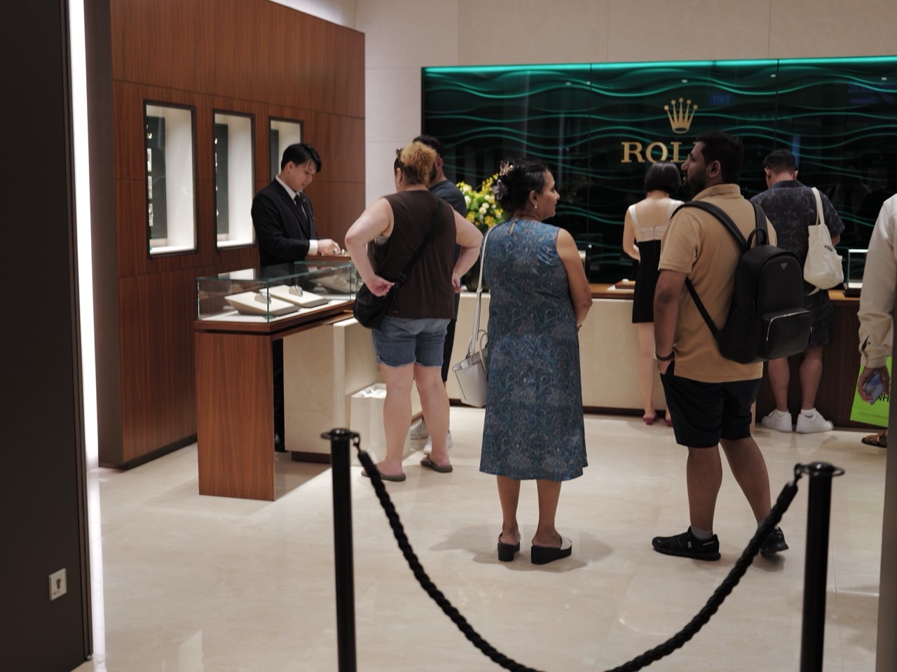 Customers receiving assistance inside a watch shop at Marina Bay Sands, Singapore.