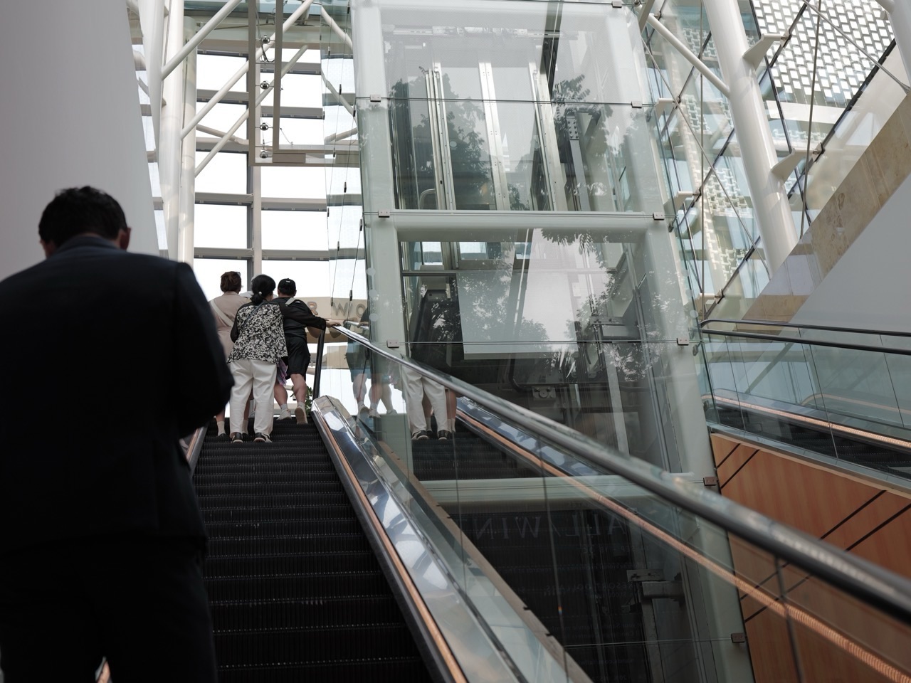 Escalator and lift details leading into the Marina Bay Sands hotel, Singapore.