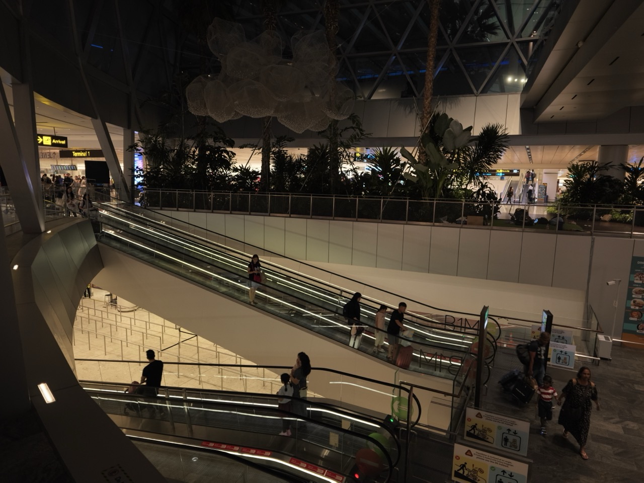 Escalator near Changi Airport Terminal 1 and Jewel Changi Airport in Singapore.