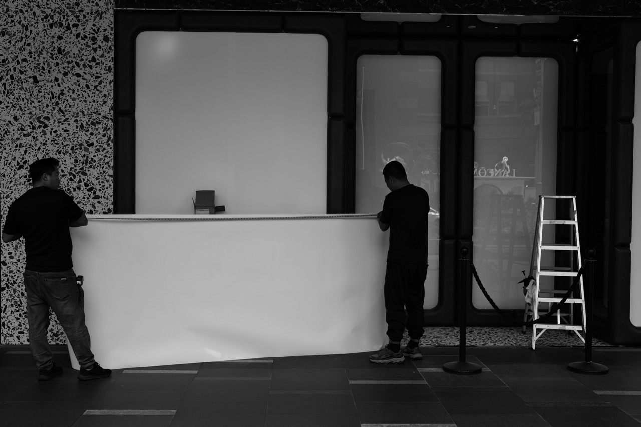 Workers outside a renovation area at Paragon on Orchard Road in Singapore.
