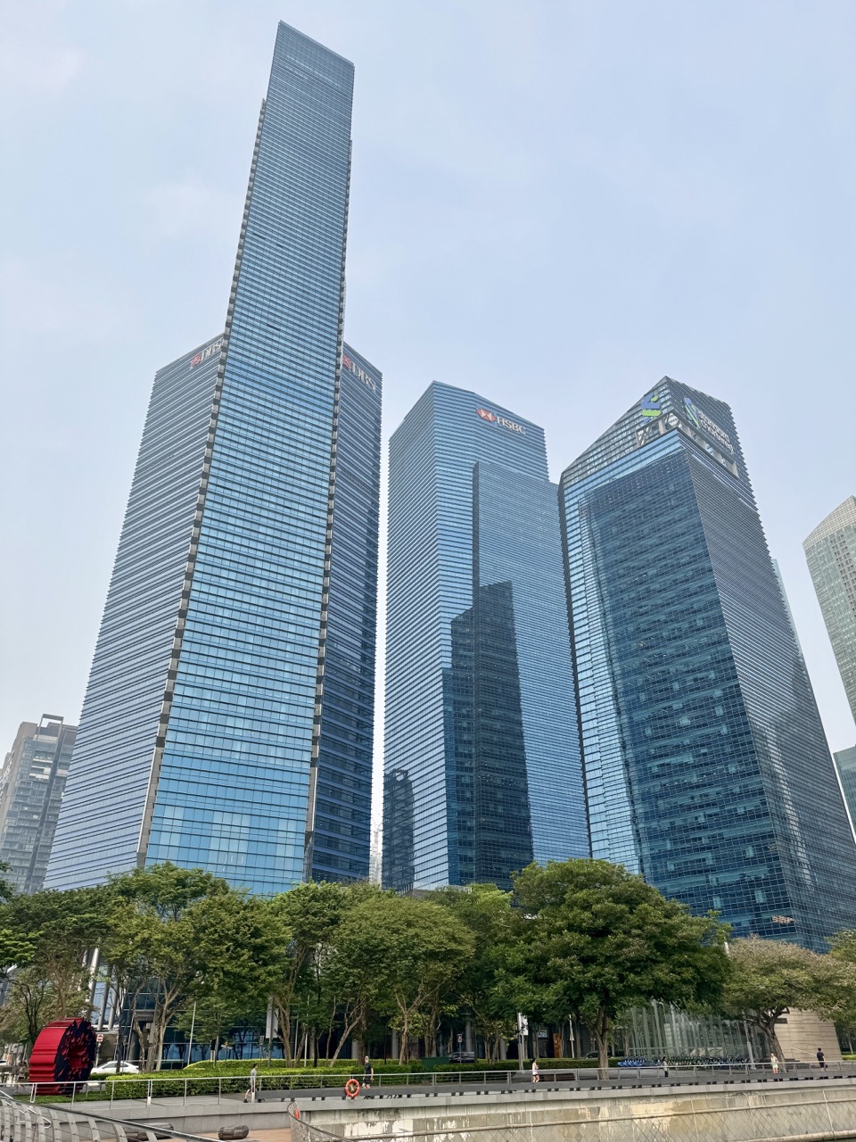 Waterfront scene outside Marina Bay Sands looking toward the Marina Bay financial district.