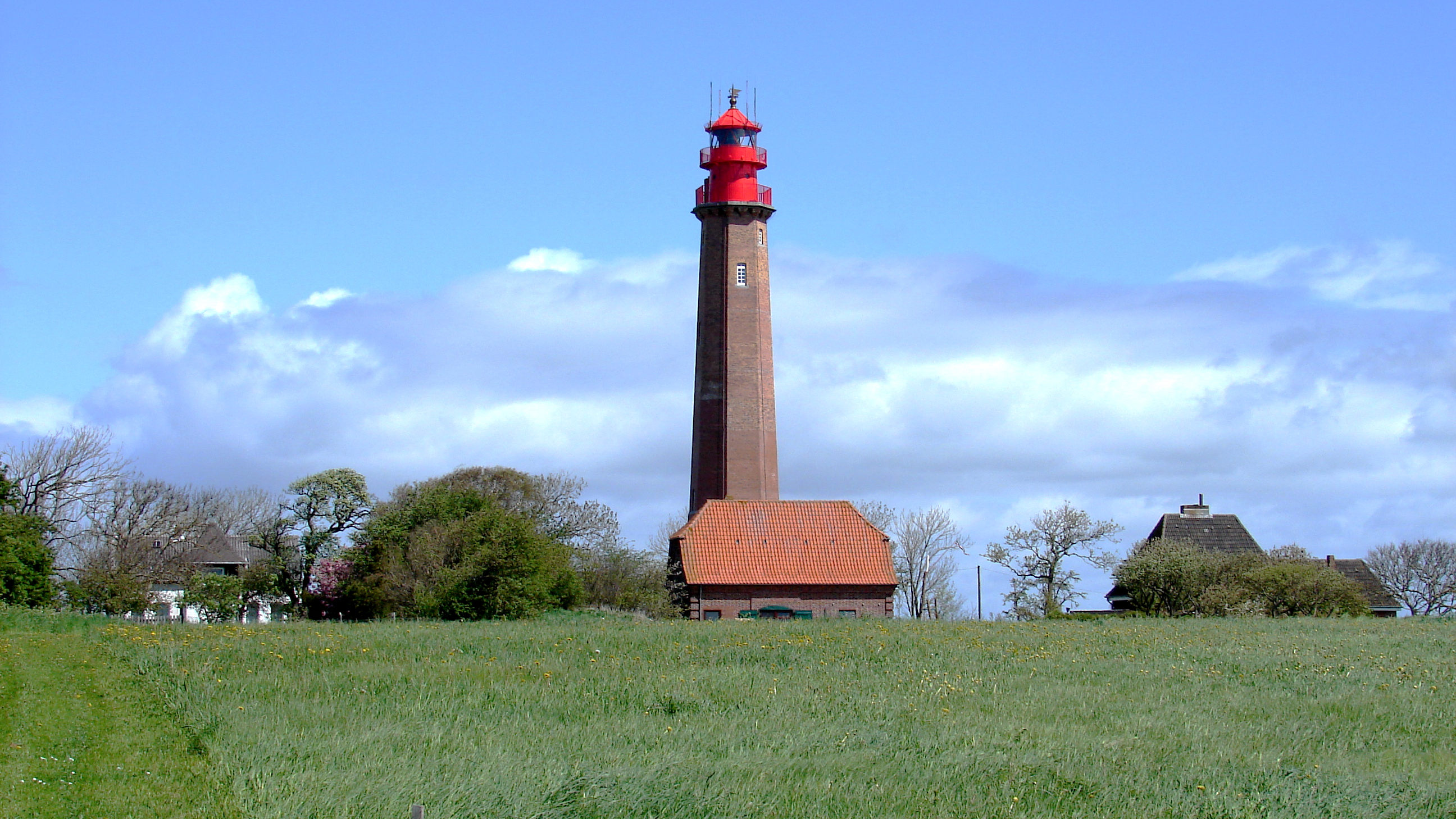 Historic Flügge lighthouse on Fehmarn, German Baltic Sea, photographed under a clear sky
