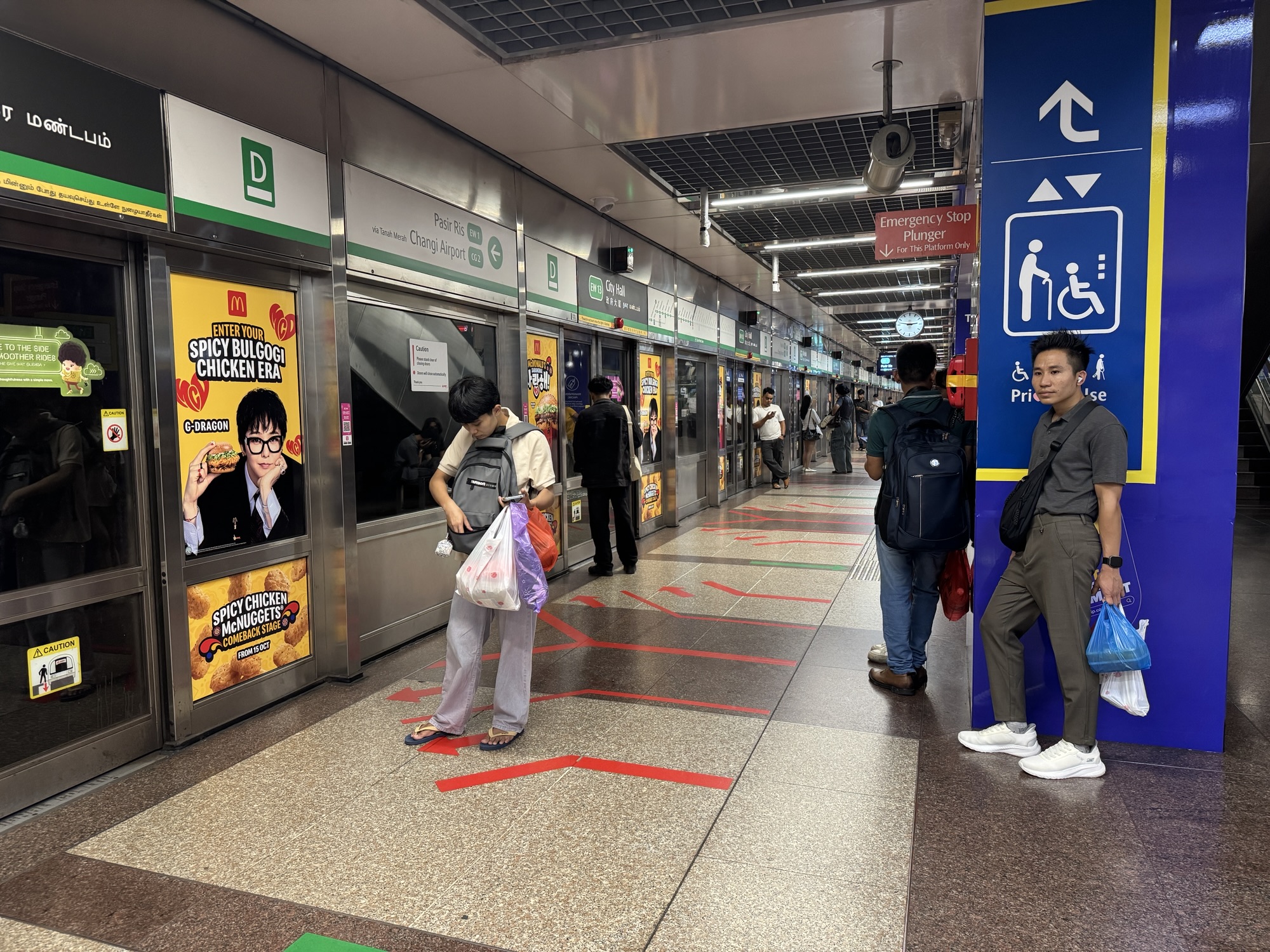 Interior of City Hall MRT station in Singapore.