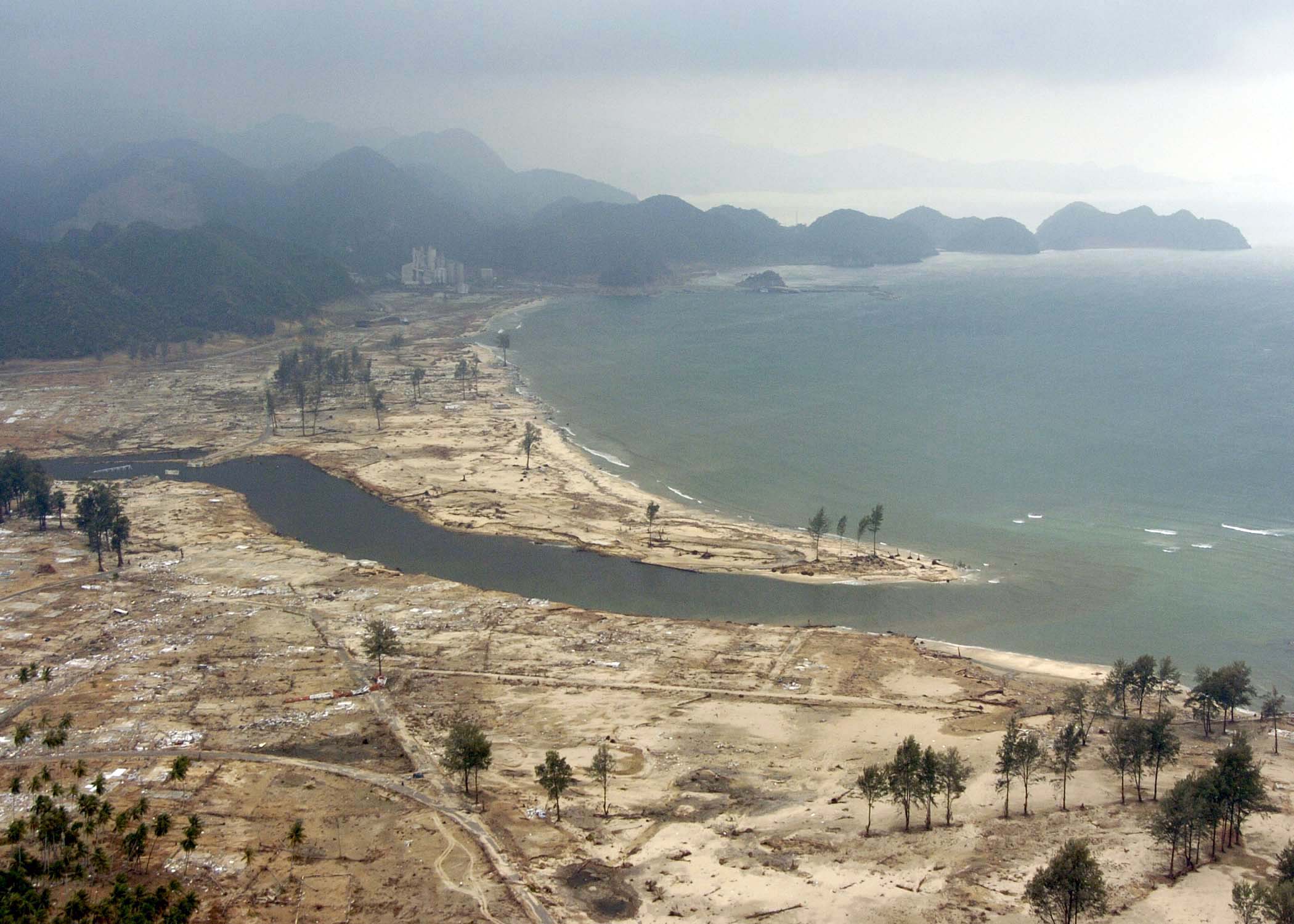 Historical US Navy aerial photograph of tsunami-damaged coastline near Aceh, Sumatra, Indonesia, taken 4 January 2005.