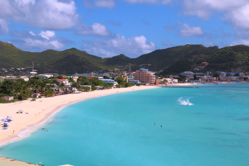 Historic 2011 elevated view of Philipsburg and Great Bay on the Dutch side of Sint Maarten, showing the curving shore, city and hills.