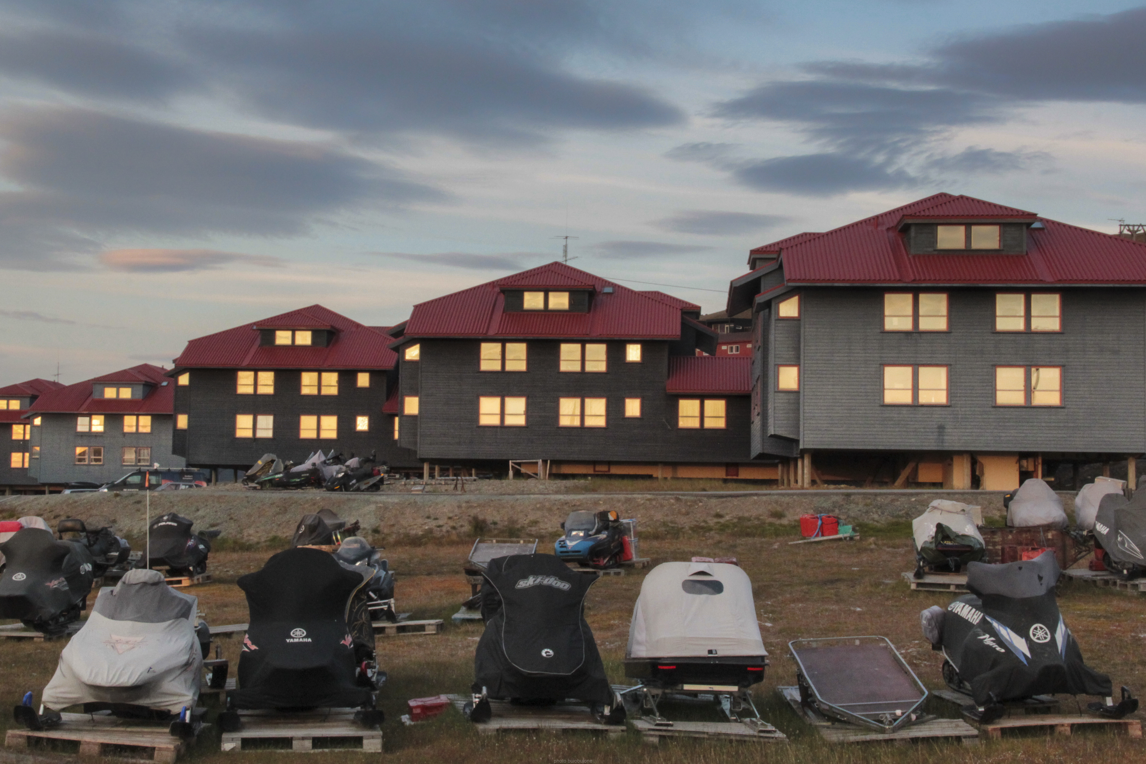 Longyearbyen, Svalbard, buildings and Arctic mountains in a 2014 archival photograph.