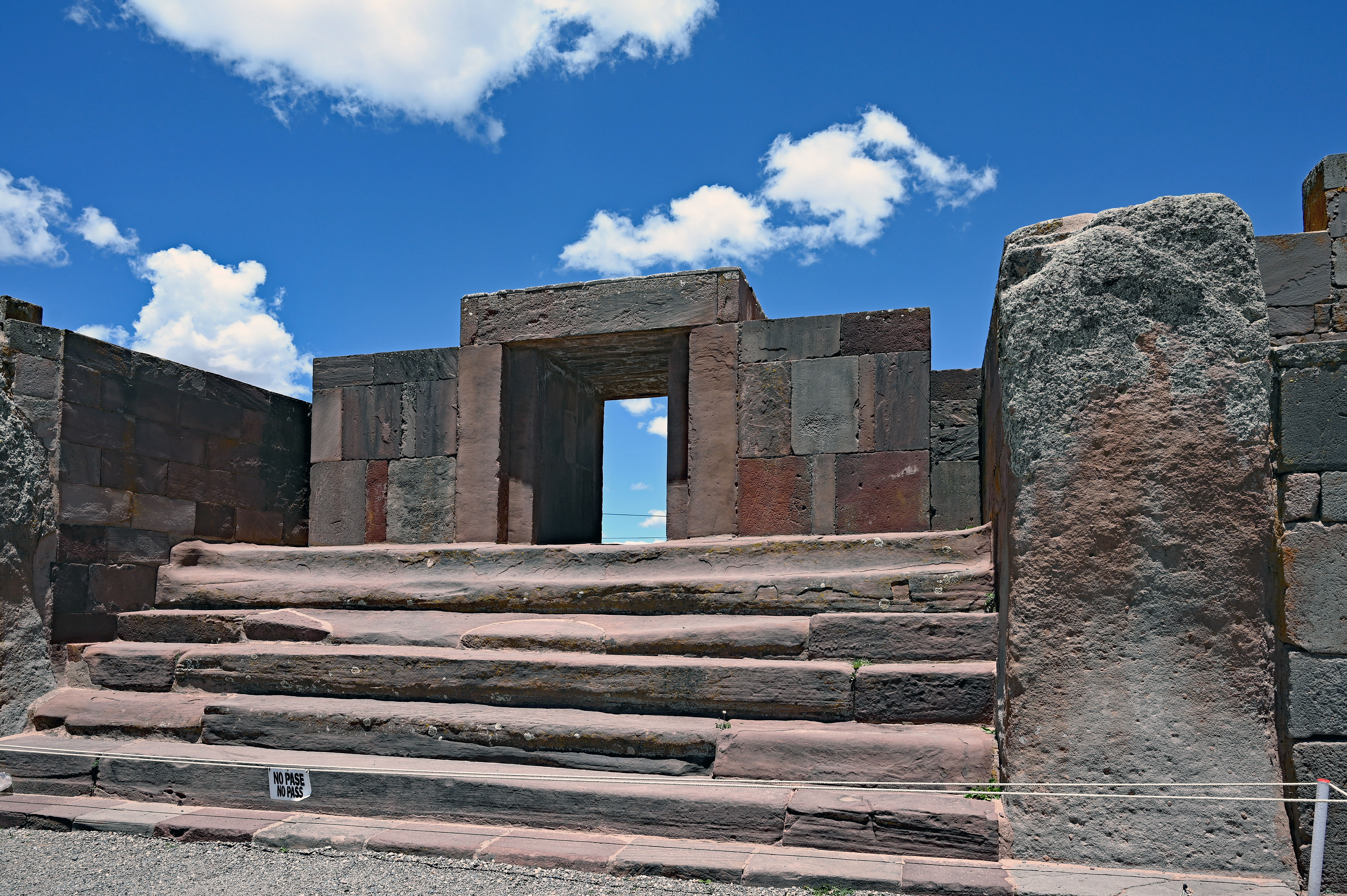Actual stone doorway and steps at Kalasasaya Temple, Tiwanaku archaeological site in Bolivia, photographed in 2025.